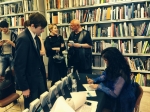 Hadani Ditmars signing copies of her book, with Steven Berkoff in the background